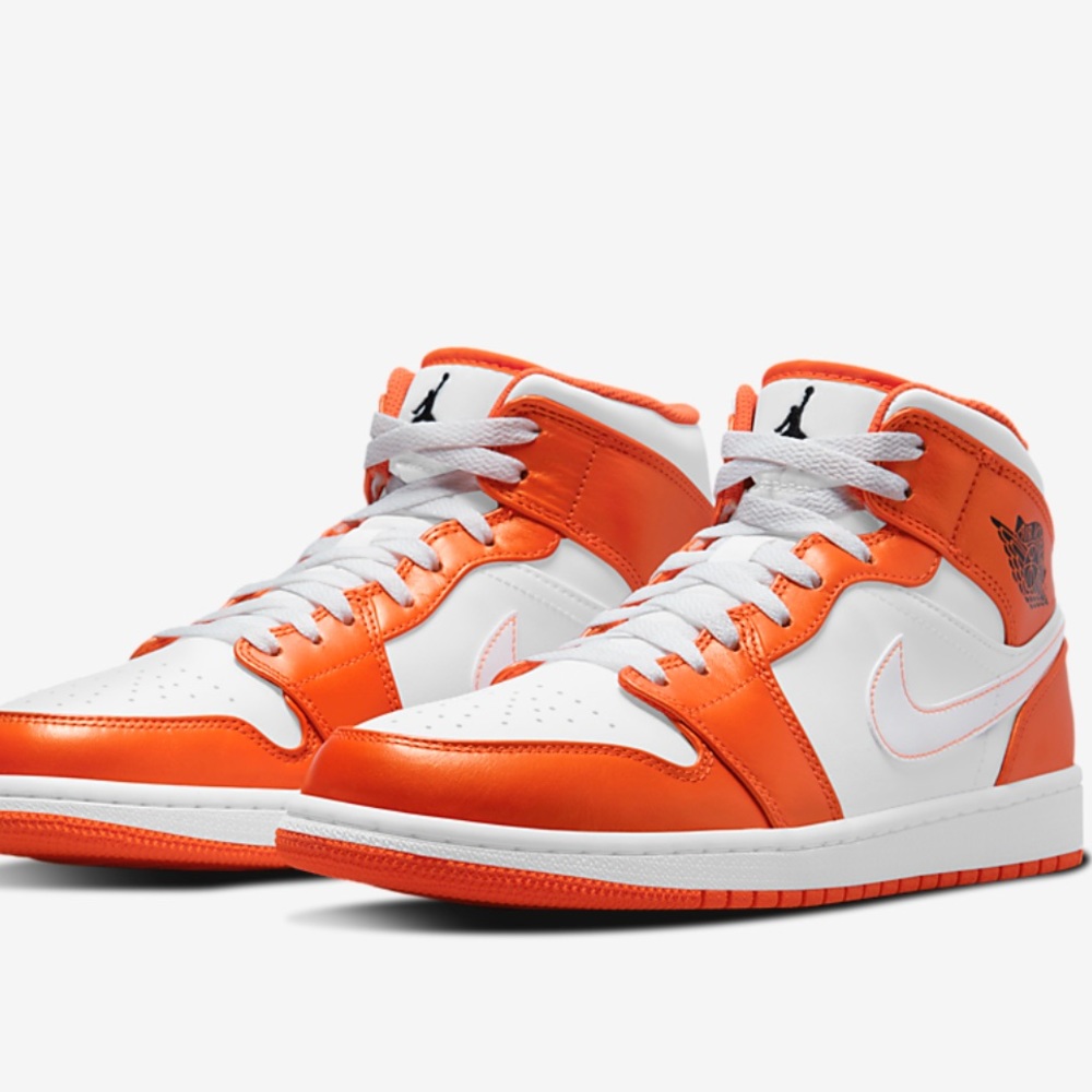 Air Jordan mid tops color Electro Orange limited edition . They are size 8.5